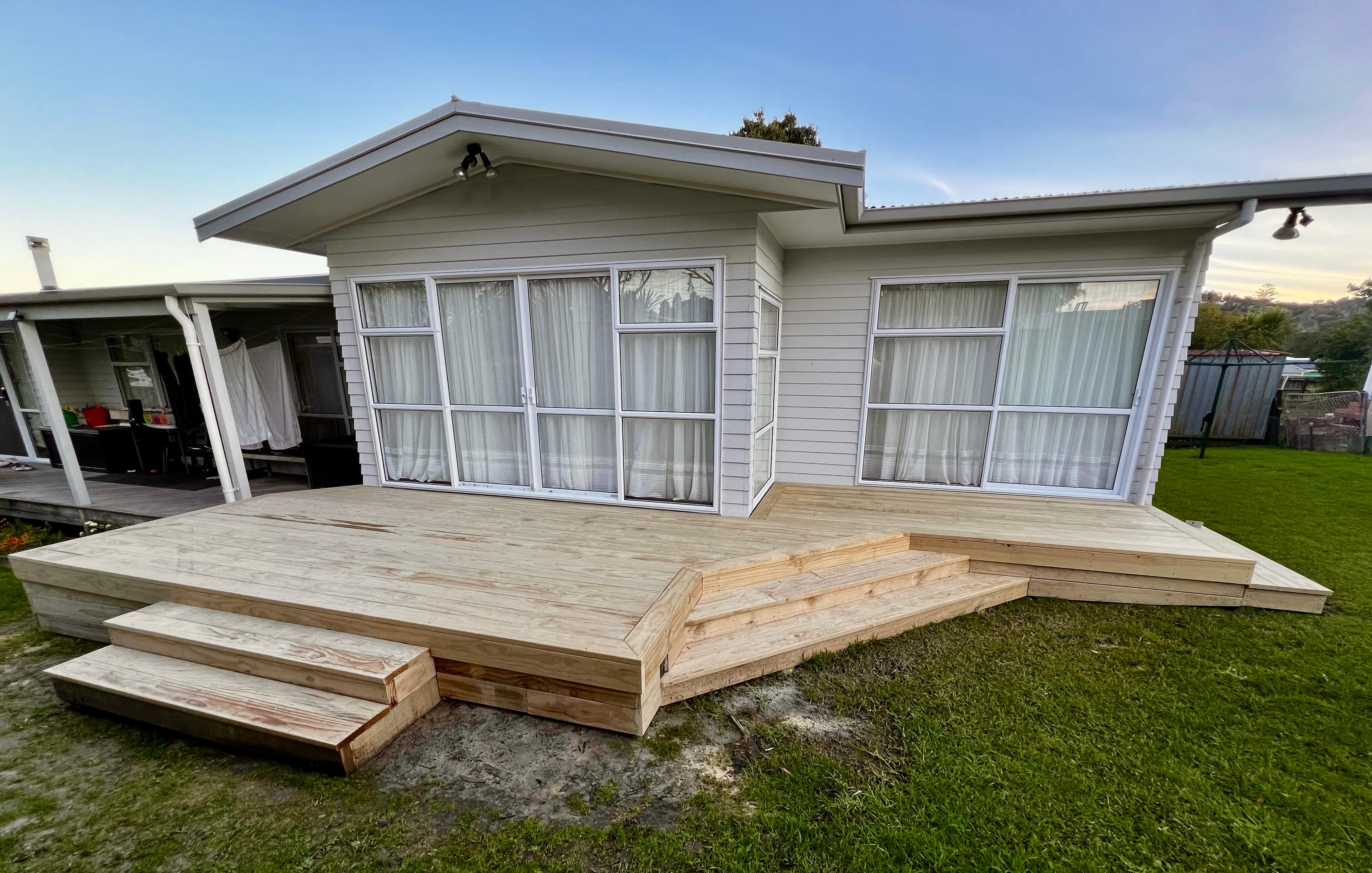 Custom-made deck with the reclad of rotten weatherboards 